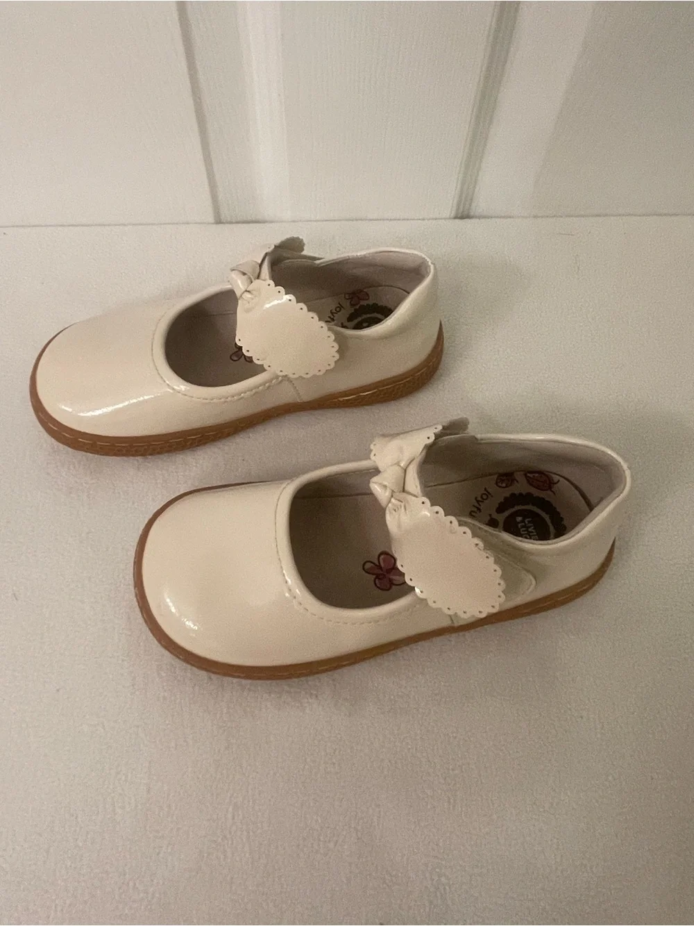 Livie & Luca Cream Patent Mary Jane Shoes with Bow Strap